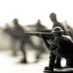 War Concept. Military Silhouettes Fighting Scene On War Fog Sky